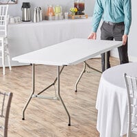 Lancaster Table & Seating 30 inch x 72 inch Heavy-Duty Granite White Plastic Bi-Folding Table